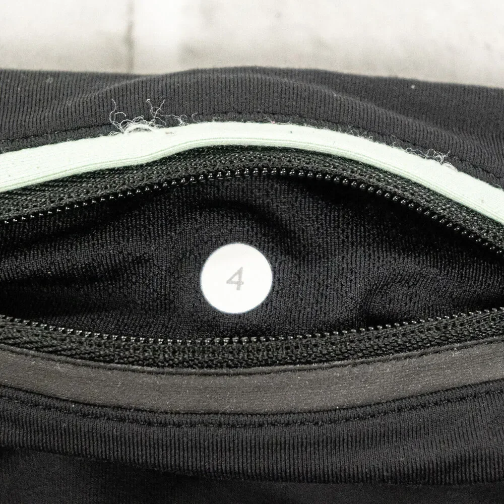 Lululemon two tone Green Black Leggings mesh side size 4